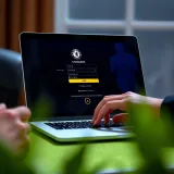User entering login credentials on Chelseabet Uganda platform on a laptop